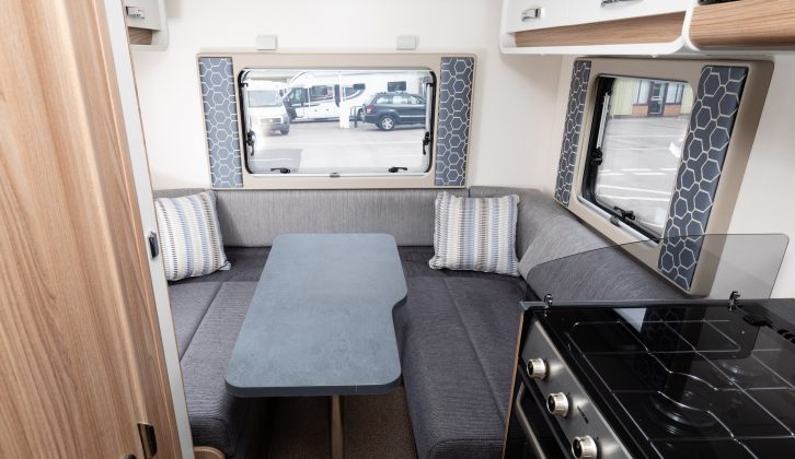 The rear lounge has a stow-away table, and overhead lockers give plenty of storage space