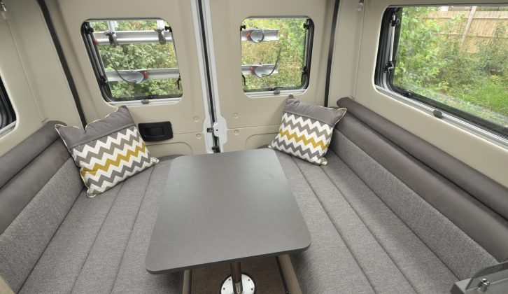 The table top for the rear lounge is stored above the driver's seat, but there's only one table leg, stored in the closet with the round table top