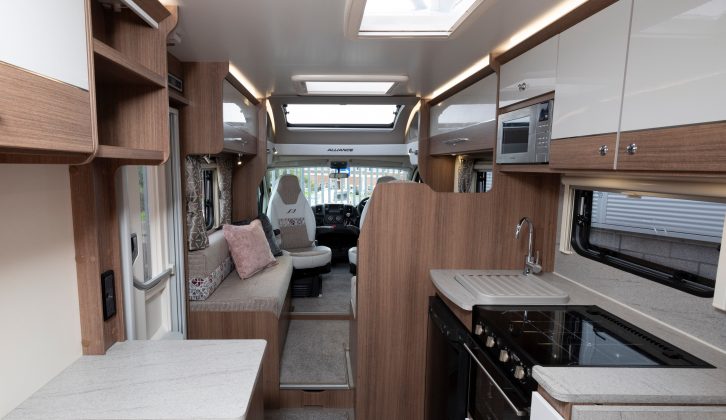 With swivelling cab seats, the lounge can accommodate six and the kitchen is kept separate