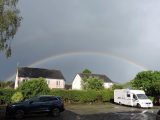 A rainbow over The Old Stables Inn's car park, where motorhomes can stay the night