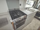The kitchen is equipped with a proper cooker, as well as lots of worktop and storage space