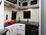 The well-planned kitchen has lots of storage space for equipment and an 800W Russell Hobbs microwave fitted at head height