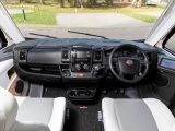 The cab is the standard Fiat layout, with cupholders in the middle, and with the handbrake to the driver's right