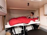 The extremely comfortable drop-down bed is easily lowered and accessed by a small ladder, but there are no rooflights here