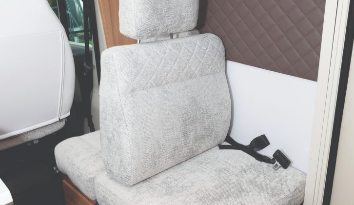There are two belted travel seats, although setting up the offside one involves inserting a metal frame and repositioning the cushions