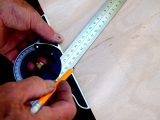 Use a protractor or gauge to mark up the 60-degree sides of the triangles on the 3.6mm plywood sheet