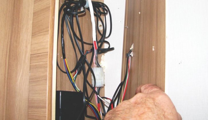 Remove internal panel from the locker to access the wiring