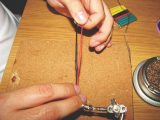 Cover the exposed wires with heat-shrink