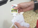 Shake the bottle and apply scratch repair solution to a soft cloth