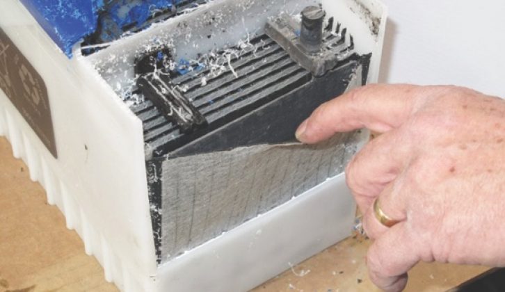 A leisure battery is lined with a sheet of fibreglass packing, which is designed to keep the lead oxide in place when the battery is cycled (discharged)