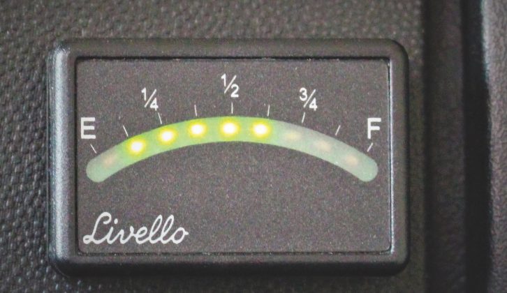 An easy-to-read level gauge with an LED display was wired in and mounted on the dashboard. Finally, leak and functions tests were completed, followed by instructions on use and maintenance
