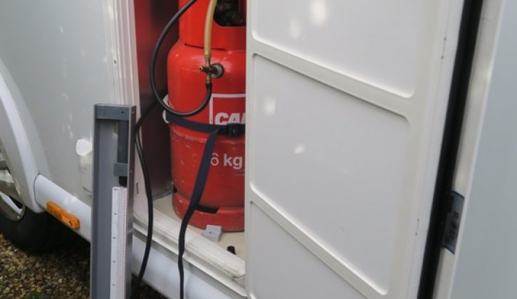 The gas system is tested by the 'tightness test', which employs a manometer to check for leaks in the system, after the fridge has been reinstalled