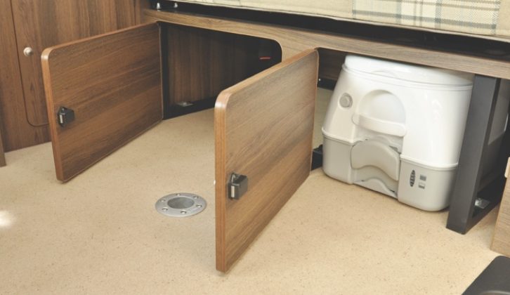 Underseat storage includes a Dometic portable toilet