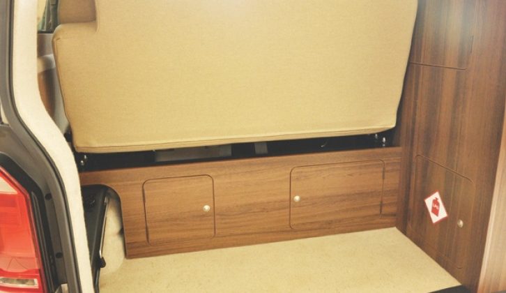 A fold-up bed section inside the tailgate optimises storage