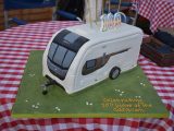 Guests tucked into this caravan-shaped chocolate cake at the launch of National Camping and Caravanning Week