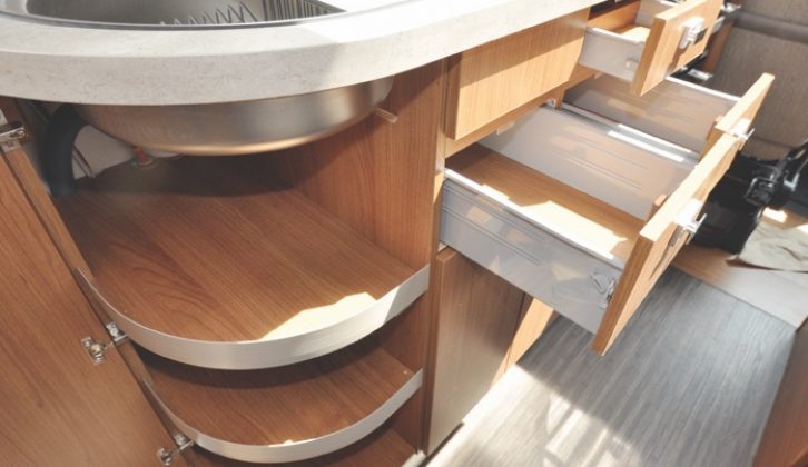 There's generous storage in the kitchen, with two lockers above, three drawers and cupboard space below the sink