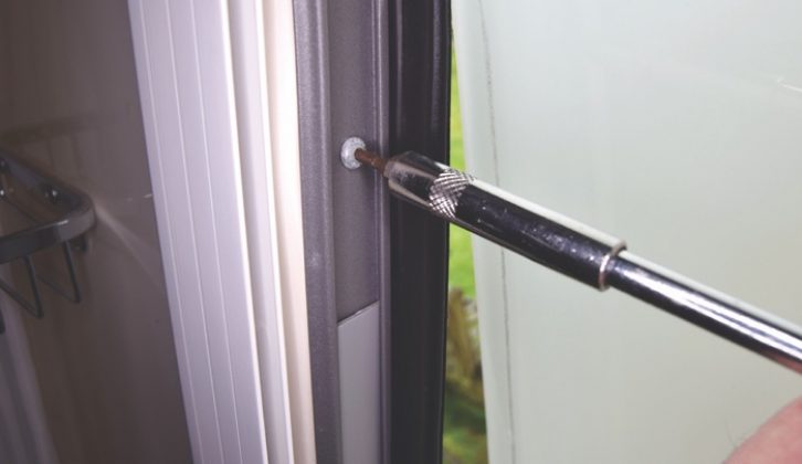 Remove the end-stop screw from the left-hand side of the window frame