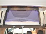The overcab bed is impressive, with a choice of lighting colour and fabric partitioning for privacy