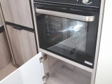 Generous kitchen storage includes a sizeable pan locker