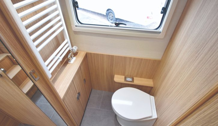 The toilet room in this model includes upgraded fittings