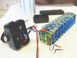 Internal components of electric bike battery, showing cells and BMS