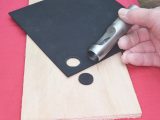 Use a 20mm washer punch to cut out a disc from the nitrile rubber sheet