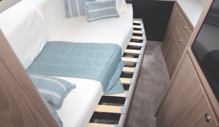 ...that can be transformed into a double bed simply by pulling out the slats and dropping the seat back