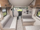 The overcab 486 is a spacious six-berth with a front dinette, fitted with soft furnishings that should withstand the rigours of family touring