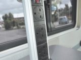 There is a handy pull-up mains socket tower in the kitchen