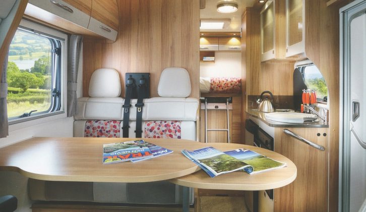 The Approach Compact 520 has a high-level transverse double above a garage and a half-dinette with two travel seats