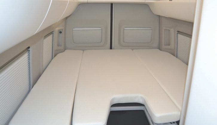 The beds at the rear sit on sprung plastic and come together to make a comfy double