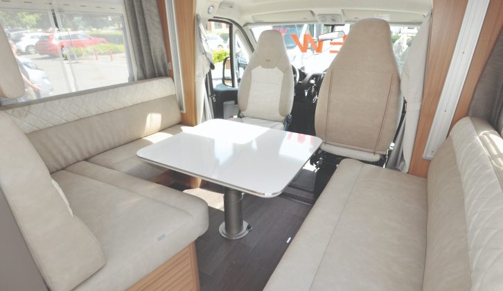 This is a generous lounge for a 6m 'van, mainly thanks to the drop-down bed above