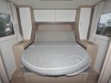 The island bed is wider than most, thanks to the angled wardrobes each side. The bed itself is retractable and has some height adjustment