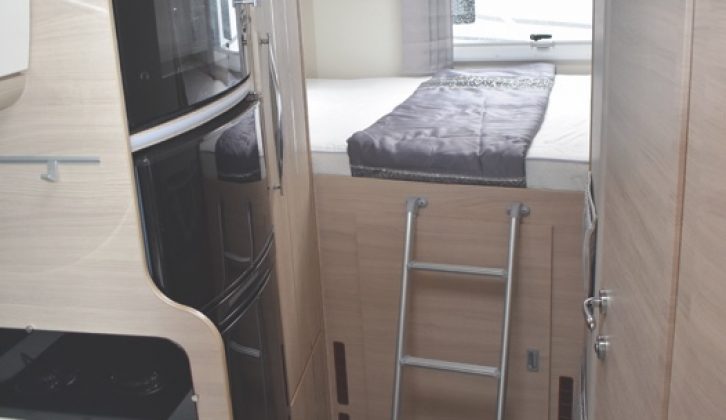 Climb the ladder to reach the transverse bed at the rear, where you'll find more handy storage, too