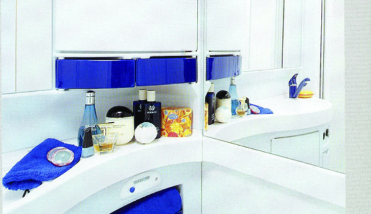Blue and white shower room furniture, as in 2001, becomes fragile with age, but can be repaired, or better still, updated