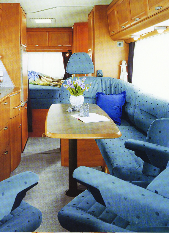 Hymer's seriously long extra-cost options list is legendary, so spec depends on the original beer's bank balance! Suffix 'L' after model number indicates inward-facing seat or Pullman dinette replaced by L-shaped settee, as pictured. 'U' indicates wrap-around rear lounge, and 'G' that permanent bed is closer to the ceiling to allow a full-size exterior-access garage below.