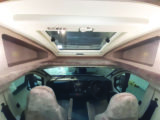 Large sunroof and storage in two spacious cubbyholes over the cab