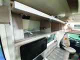 Overhead locker above the sideboard is fitted with a handy crockery rack