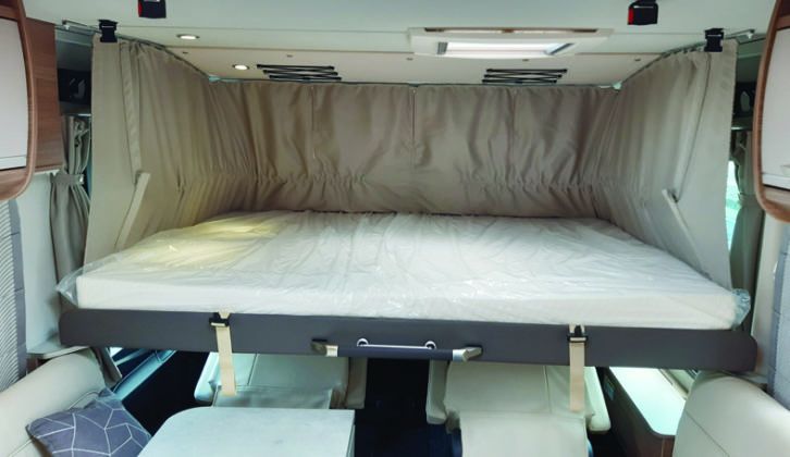 Drop-down overcab bed is roomy, with touch-control LED lights