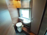 Washroom is wide and spacious, with a huge cupboard