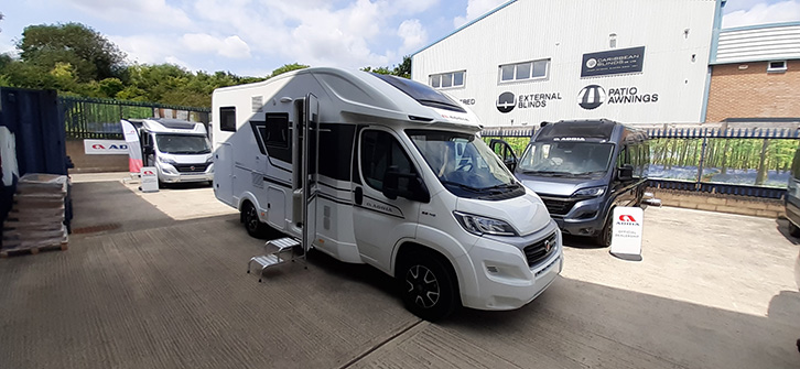 An exterior shot of the Adria Matrix 600SL Axess, parked on a forecourt