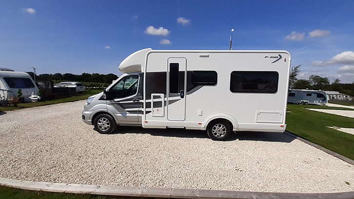 Auto-Trail F68 parked on gravel, winner of the best 2 berth motorhome at the Practical Motorhome Awards 2022