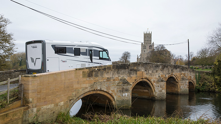 Mobilvetta Tekno Line K Yacht 86 driving over a bridge