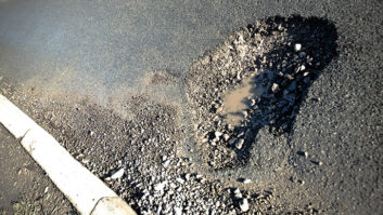 A pothole in the middle of the road