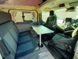The two cab seats both swivel round to complete the lounge