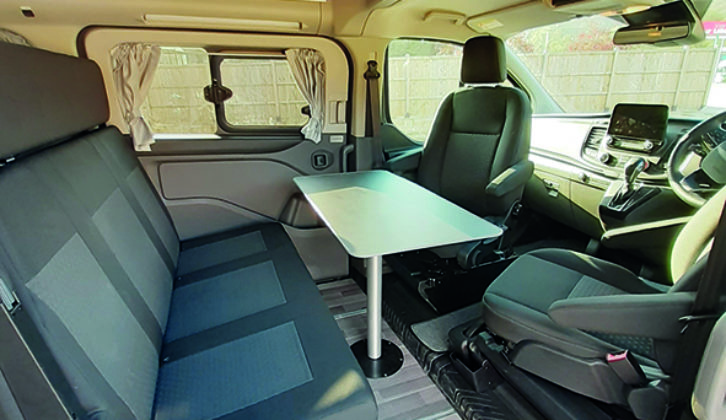 The two cab seats both swivel round to complete the lounge