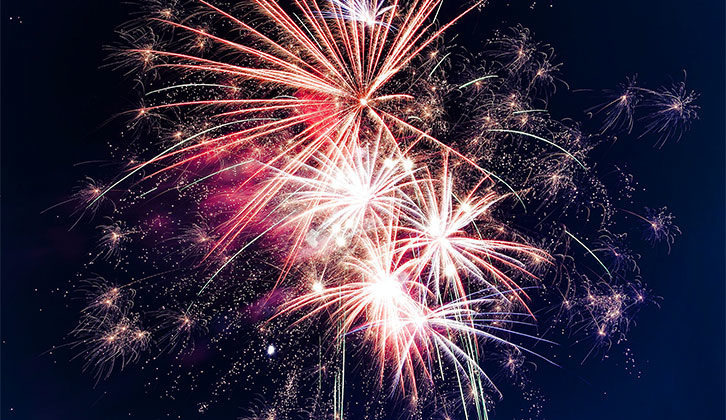 A fireworks display lighting up the sky