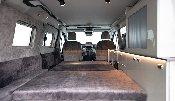 Interior shot of the campervan with the bed down