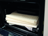 Wrap oven trays to protect them whole you're on the move