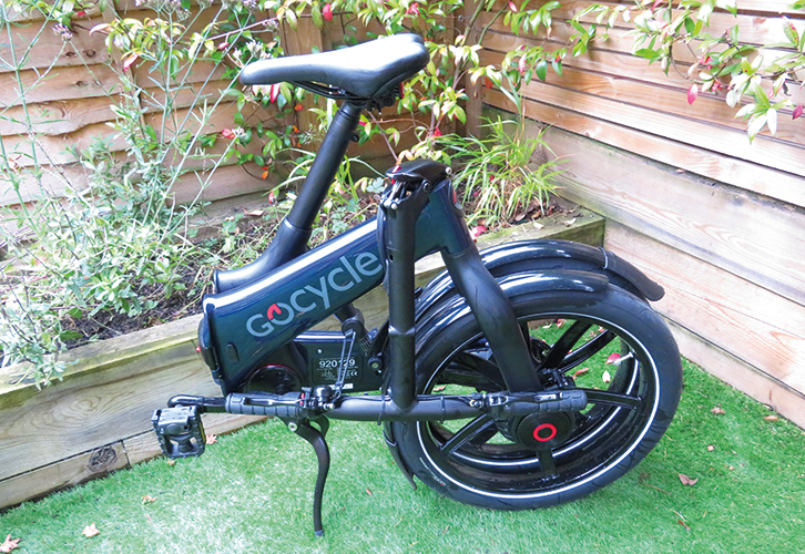 The GoCycle folded up into a compact shape